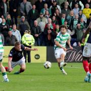 Celtic's Nicolas Kuhn scores their side's second goal of the game during the William Hill Premiership match at The Global Energy Stadium, Dingwall. Picture date: Sunday October 6, 2024. PA Photo. See PA story SOCCER Ross County. Photo credit should read: