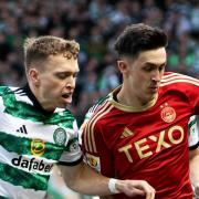 Alistair Johnston and Jamie McGrath compete for the ball