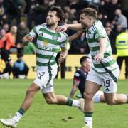 Nicolas Kuhn and James Forrest celebrate in Dingwall against Ross County