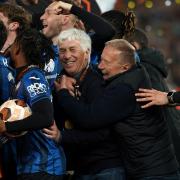 Atalanta manager Gian Piero Gasperini (centre), players and staff celebrate after the UEFA Europa League final at the Aviva Stadium, Dublin. Picture date: Wednesday May 22, 2024. PA Photo. See PA story SOCCER Final. Photo credit should read: Brian