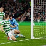 Celtic's Alistair Johnston scores their side's first goal of the game the William Hill Premiership match at Celtic Park, Glasgow. Picture date: Wednesday October 30, 2024. PA Photo. See PA story SOCCER Celtic. Photo credit should read: Andrew Milligan/PA