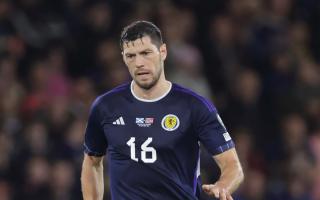 Scott McKenna in action for the national team