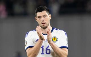 Scott McKenna in action for Scotland