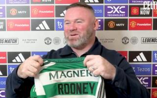 Wayne Rooney was presented with a Celtic shirt