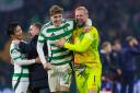 GLASGOW, SCOTLAND - NOVEMBER 05: Celtic's Arne Engels and Kasper Schmeichel at full time during a UEFA Champions League 2024/25 League Phase MD4 match between Celtic and RB Leipzig at Celtic Park, on November 05, 2024, in Glasgow, Scotland. (Photo by