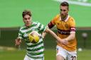 James Forrest and Stephen O'Donnell fight for possession at Celtic Park