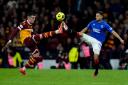 Lennon Miller, left, in action for Motherwell in the Premier Sports Cup semi-final against Rangers at Hampden earlier this month