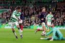 Ross County goalkeeper Jack Hamilton makes a save from Celtic's Alex Valle