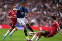 Rangers’ Cyriel Dessers has his shot blocked by Manchester United's Leny Yoro during a pre-season friendly at Murrayfield