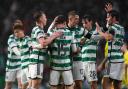 The Celtic players celebrate after Odin Thiago Holm had got on the scoresheet against Buckie Thistle.