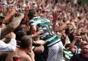 Daizen Maeda celebrates with Celtic supporters
