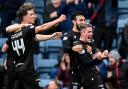 Luke McCowan celebrates scoring for Dundee