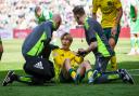 Celtic's Kyogo Furuhashi gets treatment for an injury