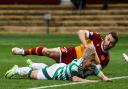 Motherwell's Stephen O'Donnell and Celtic's Daizen Maeda collide