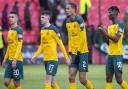 CUMBERNAULD, SCOTLAND - FEBRUARY 9: CelticÕs Marian Shved, Ryan Christie, Christopher Jullien and Vakoun Issouf Bayo (L-R) feel the chill at full time during a William Hill Scottish Cup fifth round match between Clyde and Celtic at Broadwood Stadium, on