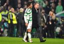 Celtic manager Brendan Rodgers, right, and goalscorer Reo Hatate celebrate victory over RB Leipzig