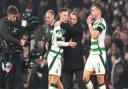 Callum McGregor and Brendan Rodgers embrace after RB Leipzig win at Celtic Park