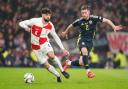 Croatia's Josko Gvardiol and Scotland's Anthony Ralston battle for the ball during the UEFA Nations League Group A1 match at Hampden Park, Glasgow