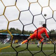 Daizen Maeda curls home to make it 3-0 to Celtic against Livingston