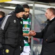 Cameron Carter-Vickers embraced by Brendan Rodgers