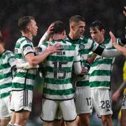 The Celtic players celebrate after Odin Thiago Holm had got on the scoresheet against Buckie Thistle.