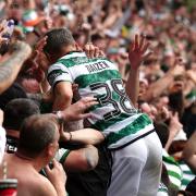 Daizen Maeda celebrates with Celtic supporters