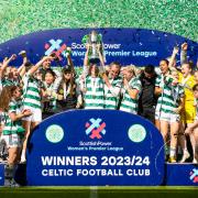 The Celtic FC Women's side celebrate their league title at Celtic Park