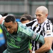 Alex Gogic and Adam Idah tussle in Paisley