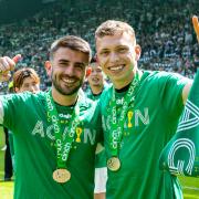 Celtic's Greg Taylor and Alistair Johnston celebrate winning the 2023/24 Scottish Premiership