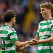 Nicolas Kuhn and Arne Engels celebrate a goal at Celtic Park