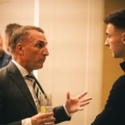 Brendan Rodgers and Kieran Tierney seemingly locked in conversation at a Celtic charity event