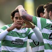 Virgil Van Dijk celebrates his first goal for Celtic with Charlie Mulgrew