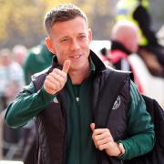 Celtic’s Callum McGregor is taking in the match as a spectator