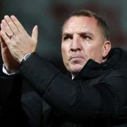 Brendan Rodgers applauds the crowd