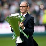 Martin O'Neill presents the Scottish Premiership trophy at Celtic Park