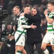 Callum McGregor and Brendan Rodgers embrace after RB Leipzig win at Celtic Park