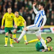 Reo Hatate tackles Liam Donnelly