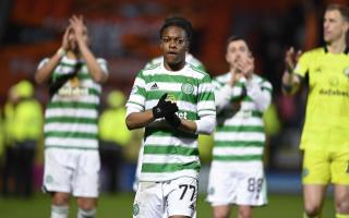 Karamoko Dembele celebrates with his Celtic teammates after a Scottish Cup match