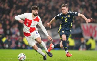 Croatia's Josko Gvardiol and Scotland's Anthony Ralston battle for the ball during the UEFA Nations League Group A1 match at Hampden Park, Glasgow