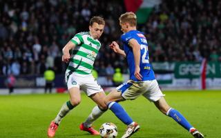 Celtic's Alistair Johnston and St Johnstone's Matt Smith battle for the ball